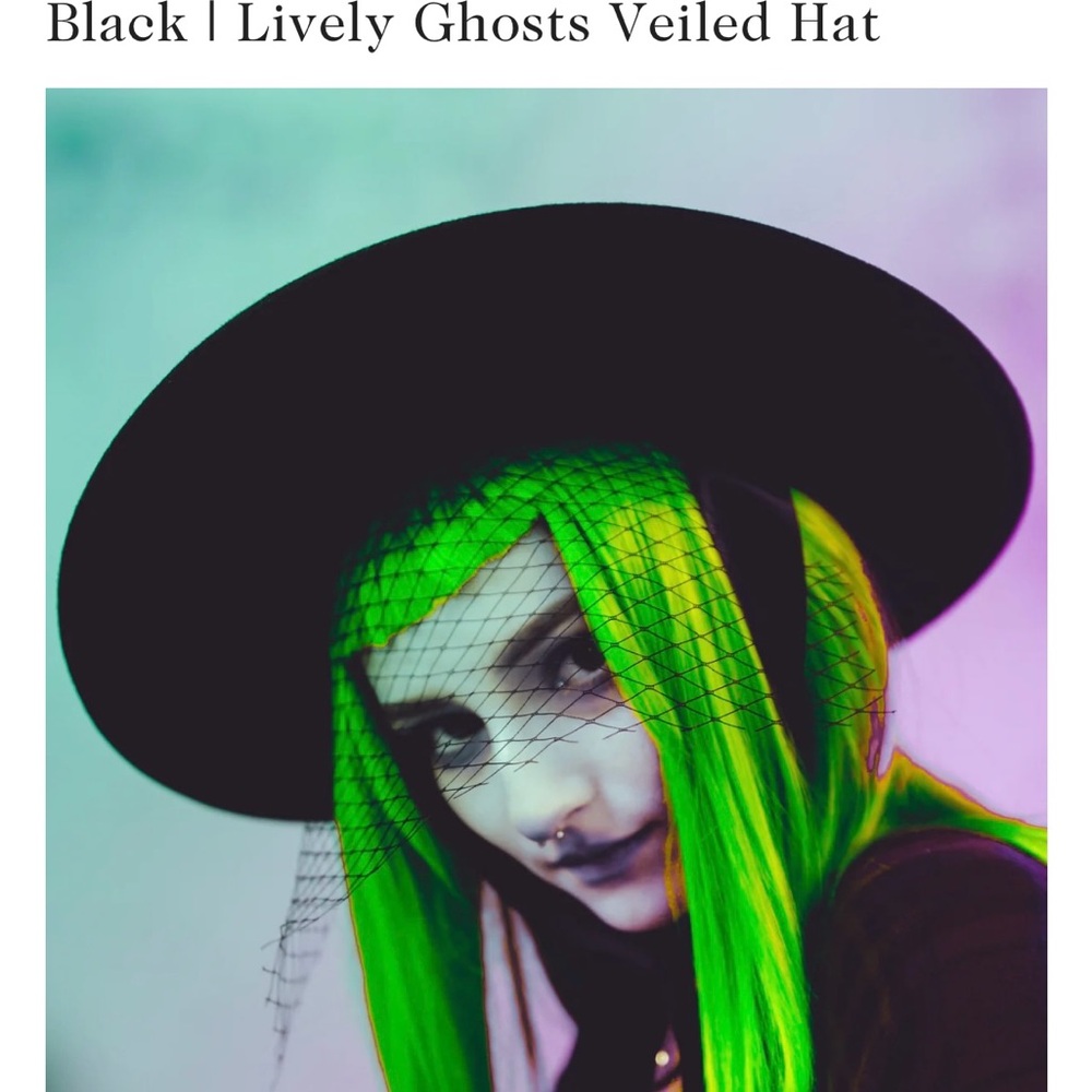 Black veiled hat by Lively ghosts.